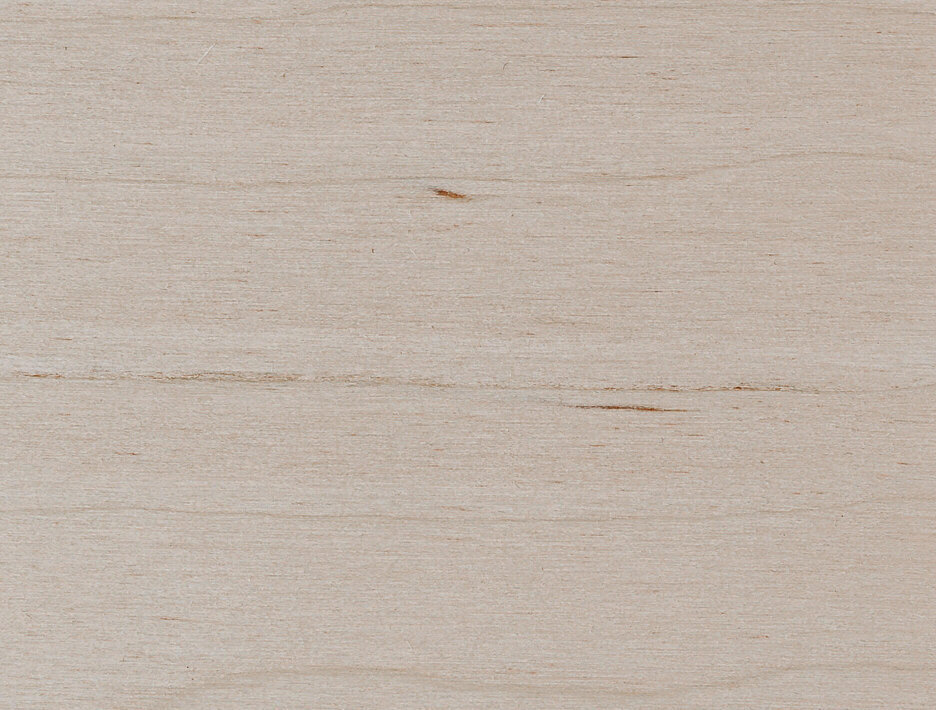 Sklejka drewniana z widocznym usłojeniem.