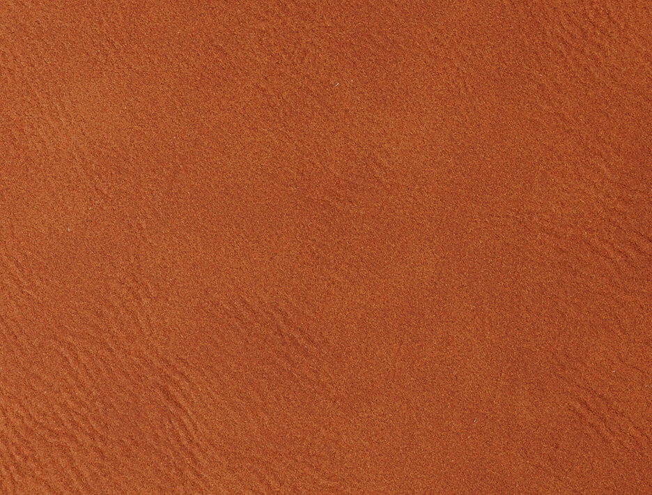 Brązowa tekstura skóry z bliska.